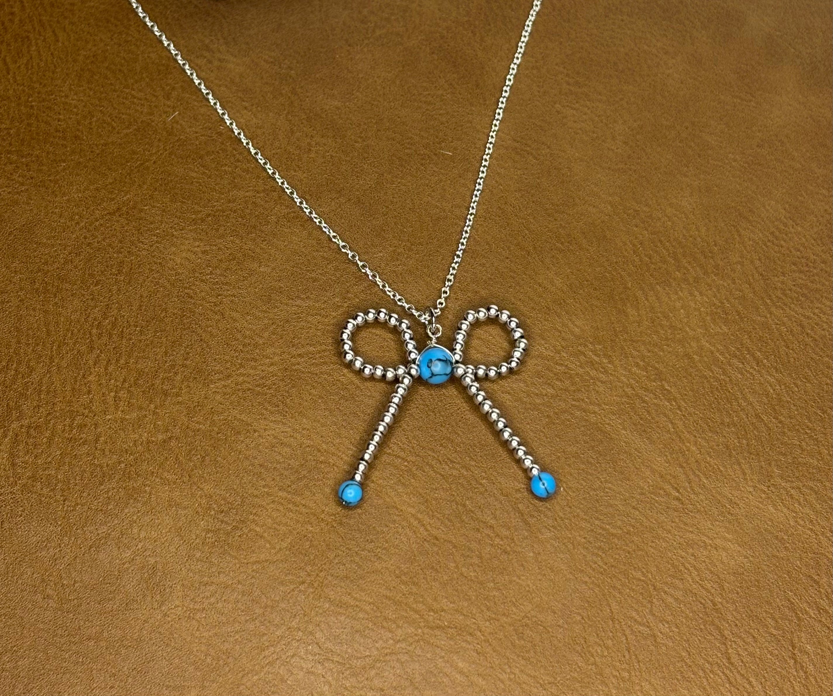 Silver & turquoise bow necklace