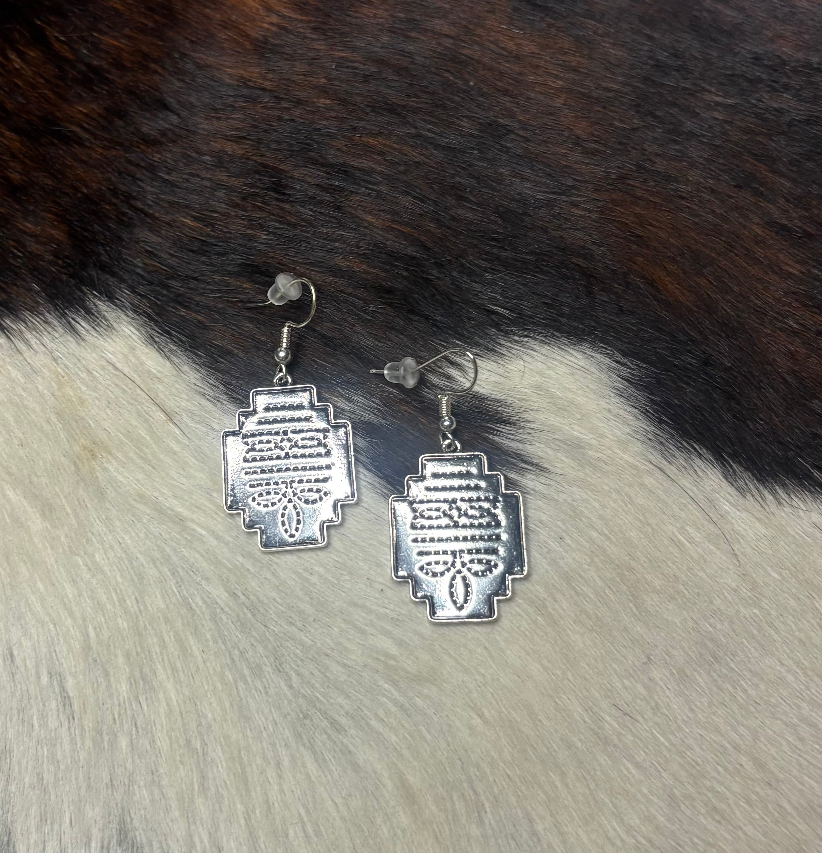 Silver boot stitch earrings