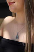 Silver and turquoise cow tag necklace ￼