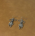 Roping cowboy earrings