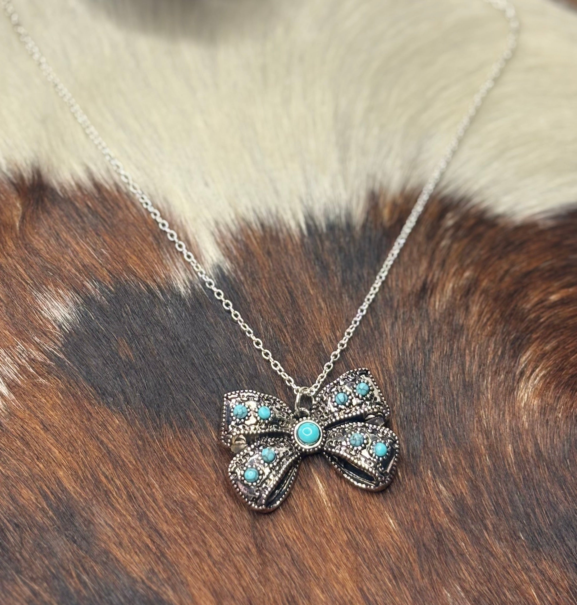 Silver turquoise bow thick necklace